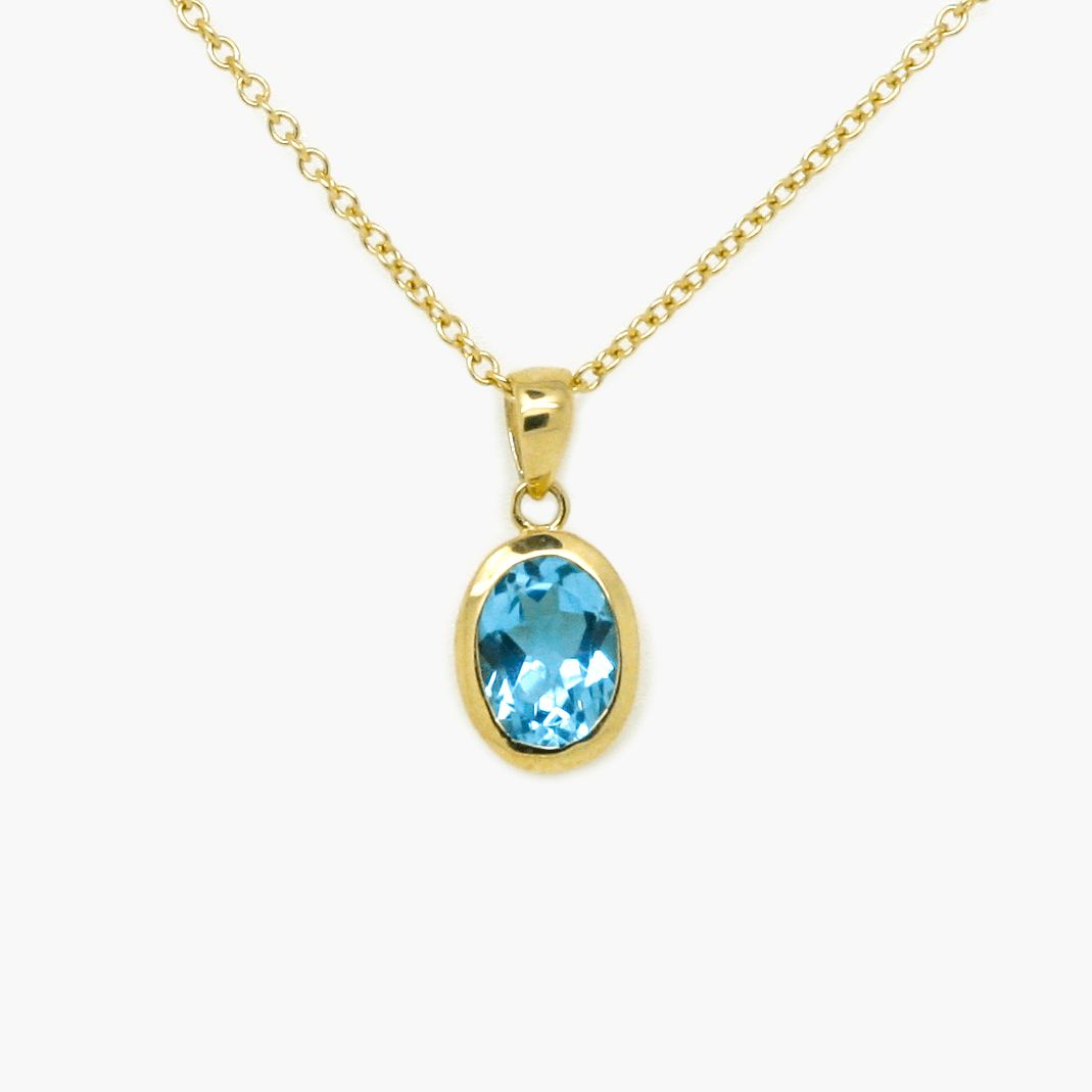 NEW 9 Carat Yellow Gold Blue Topaz Pendant Necklace - Jordans Jewellers