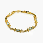 Pre-Owned 9ct Gold Blue Topaz Bracelet - Jordans Jewellers
