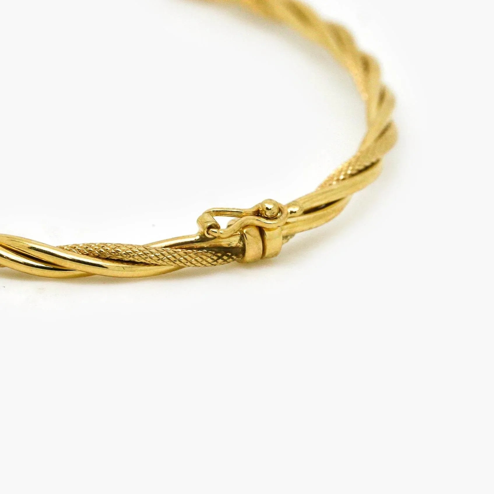 9ct Yellow Gold Textured Twisted Bangle - Jordans Jewellers