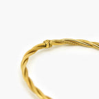 9ct Yellow Gold Textured Twisted Bangle - Jordans Jewellers
