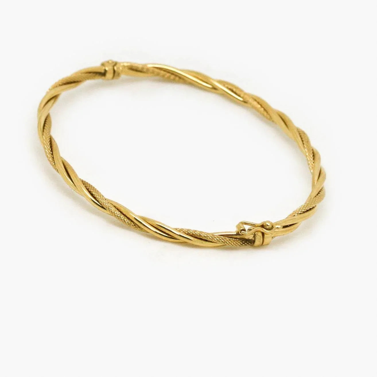 9ct Yellow Gold Textured Twisted Bangle - Jordans Jewellers