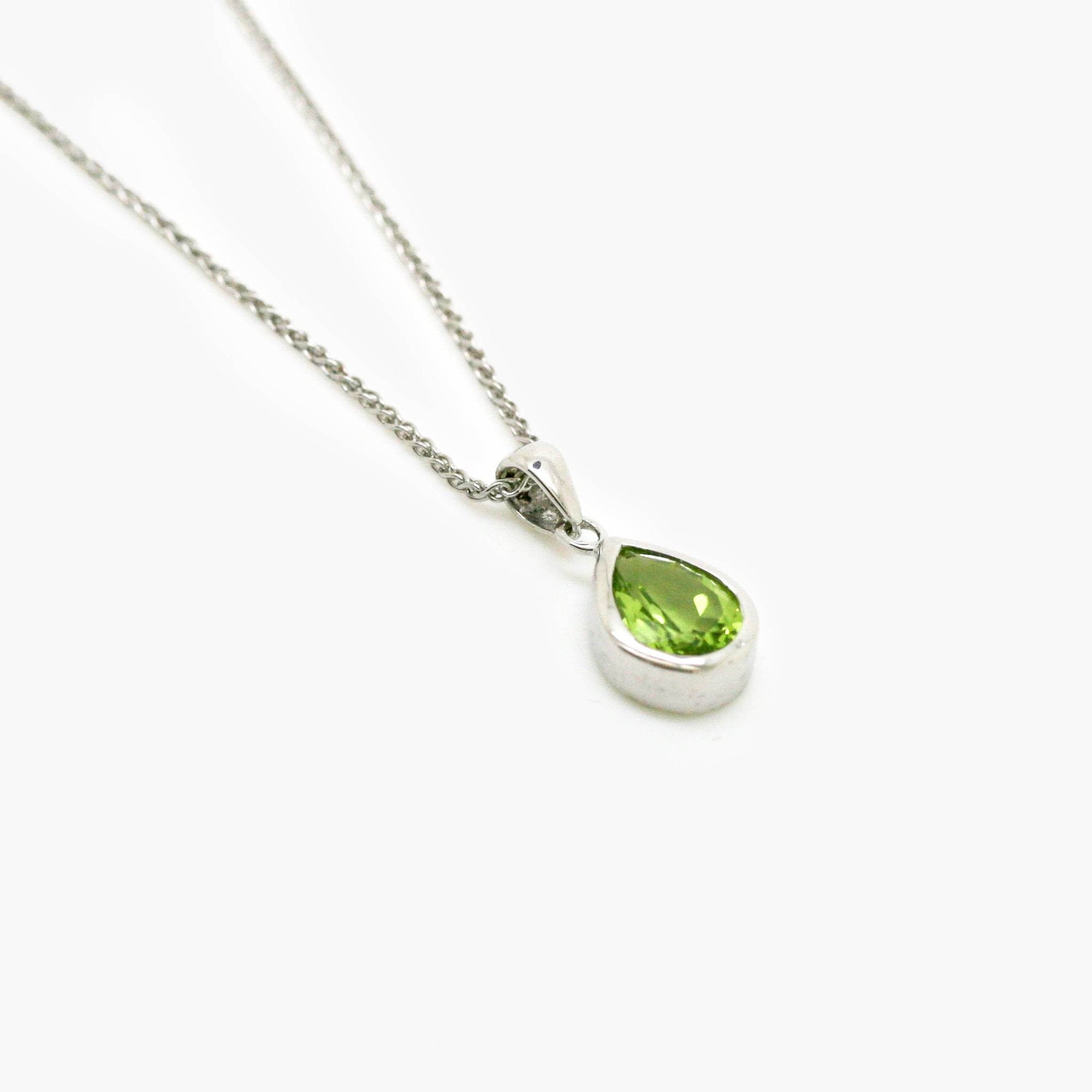 Pear Shaped Peridot Pendant Necklace in 9ct White Gold - Jordans Jewellers