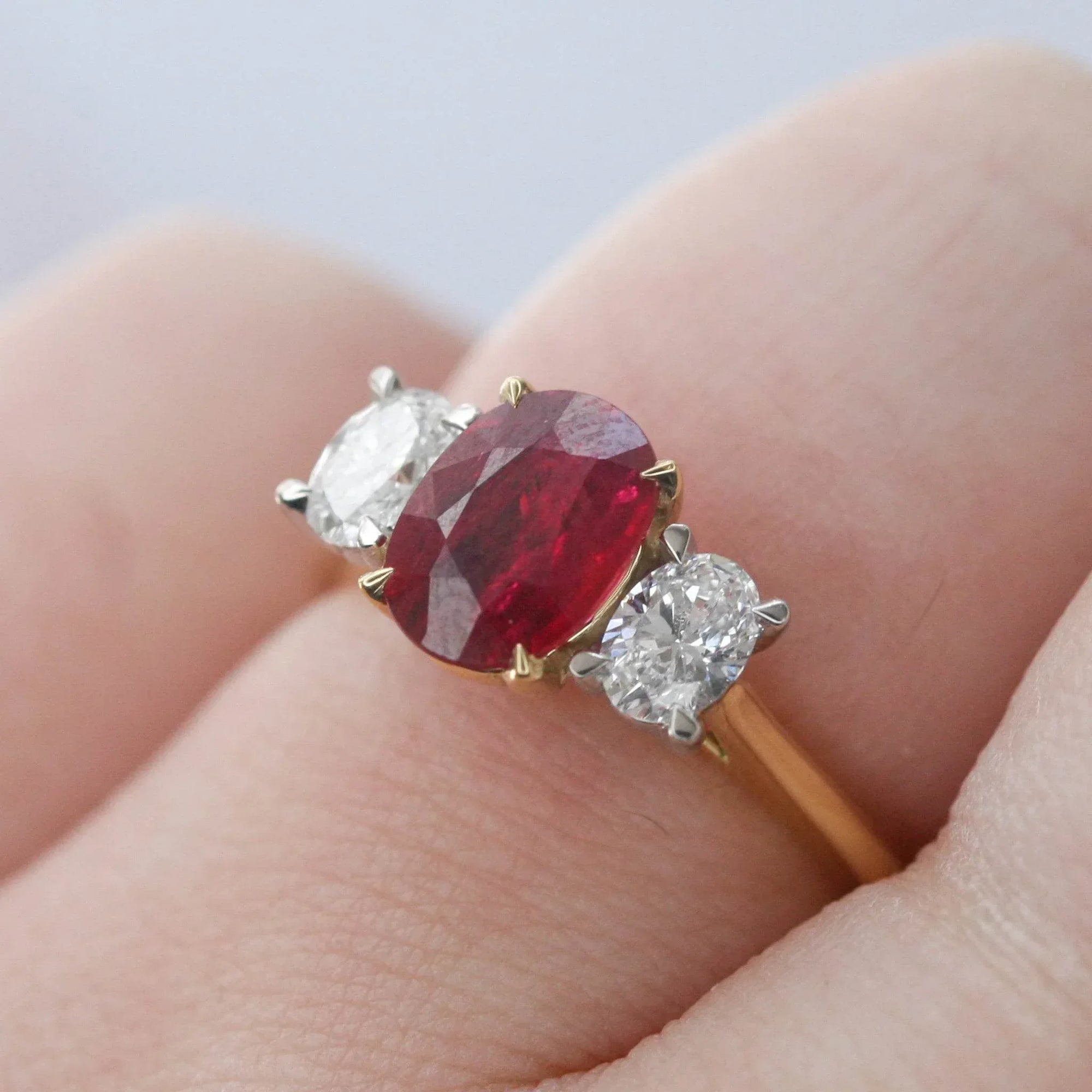 Oval Ruby & Diamond Three Stone Ring 18ct White & Yellow Gold - Jordans Jewellers
