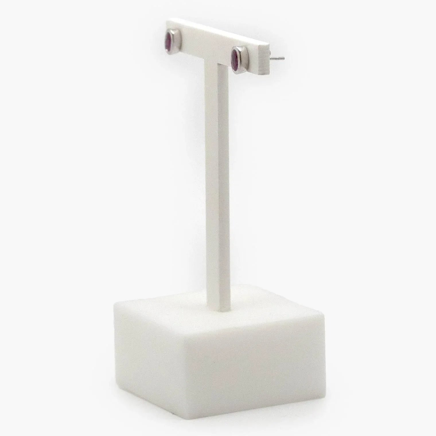 18 Carat White Gold Oval Ruby Stud Earrings - Jordans Jewellers