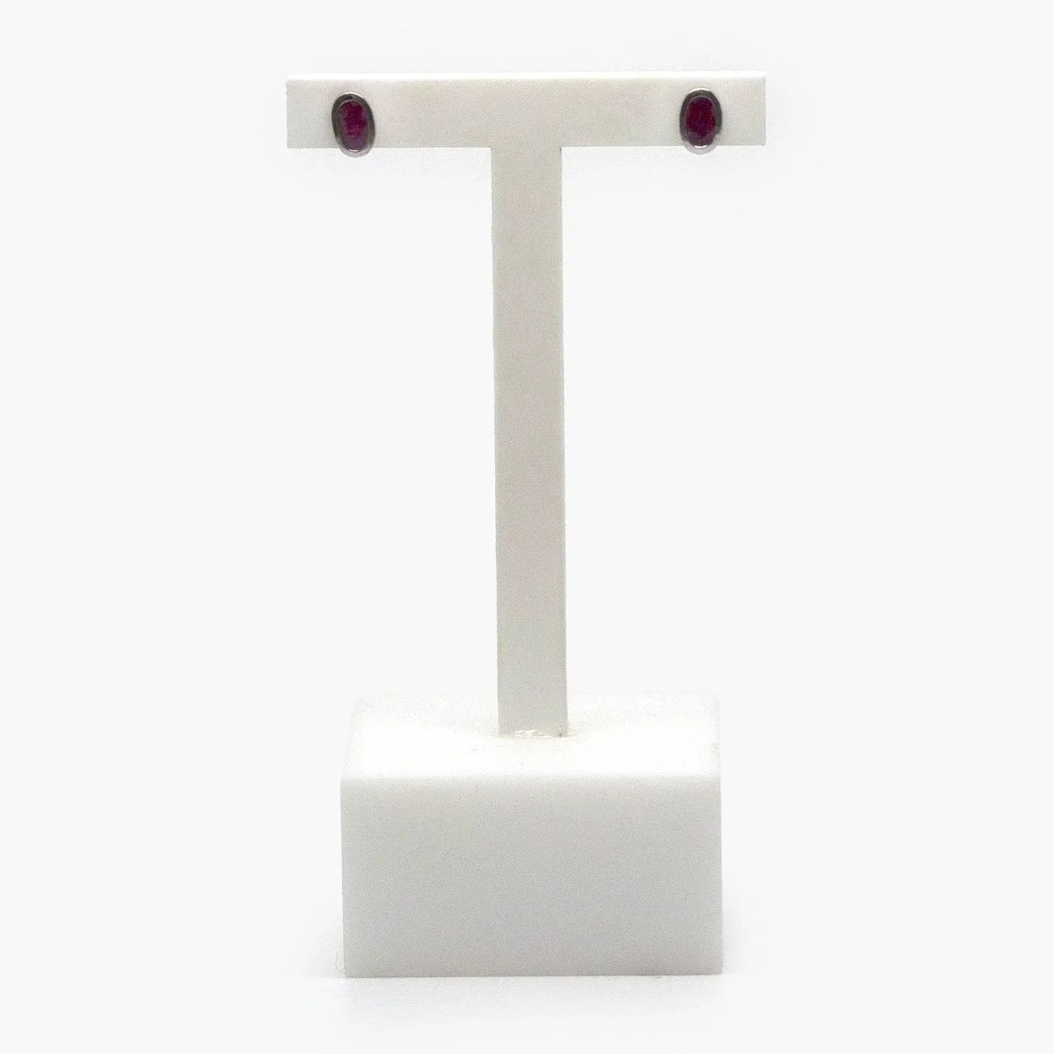 18 Carat White Gold Oval Ruby Stud Earrings - Jordans Jewellers