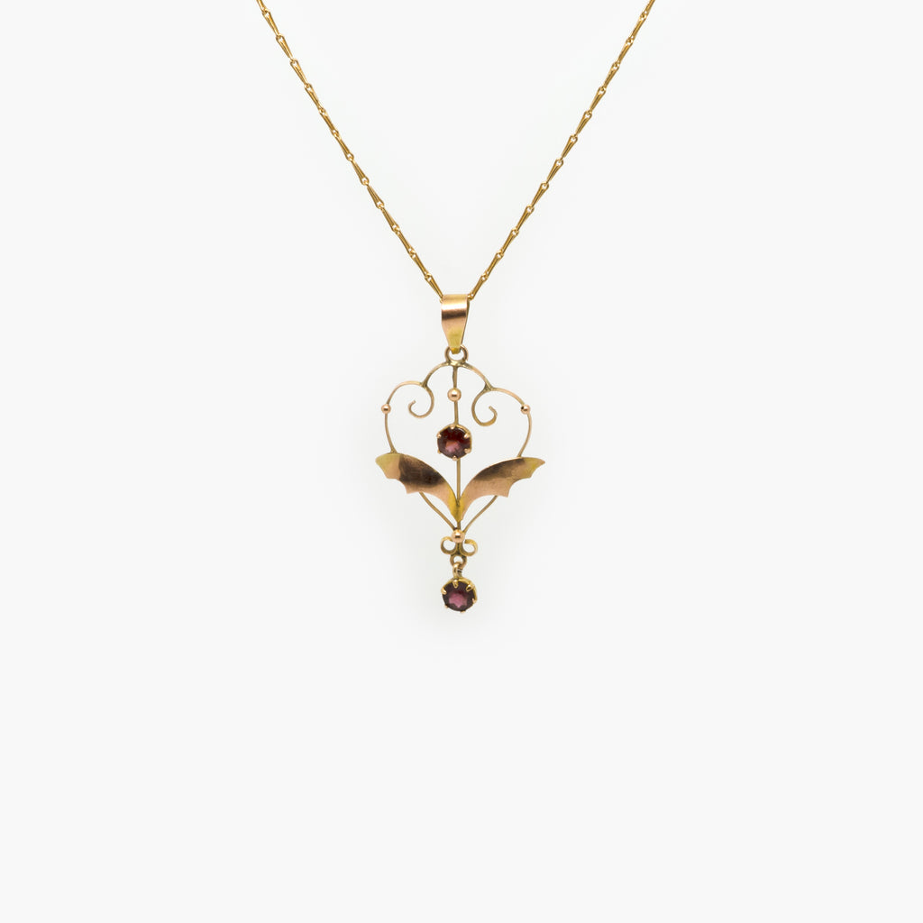 Jordans Jewellers 9ct yellow gold antique garnet pendant and a new 9ct hayseed chain