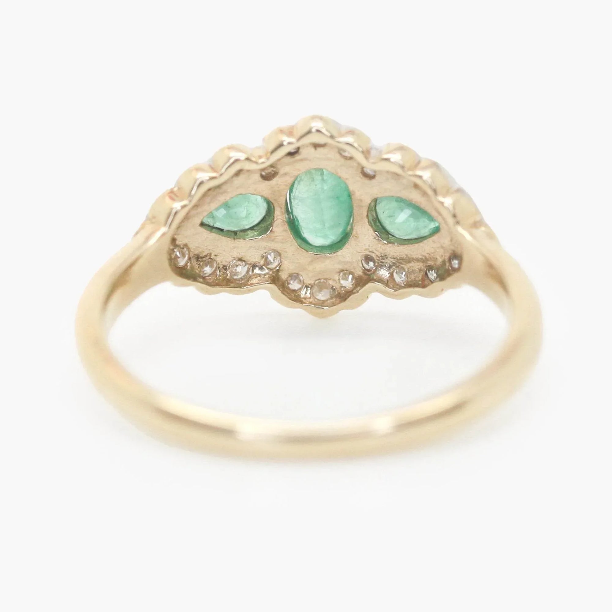 Art Deco Style Three Stone Emerald and Diamond Halo Ring - Jordans Jewellers