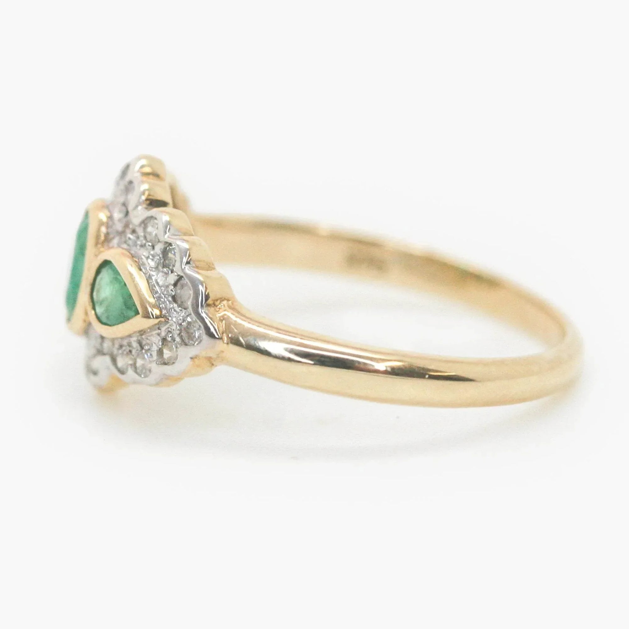 Art Deco Style Three Stone Emerald and Diamond Halo Ring - Jordans Jewellers