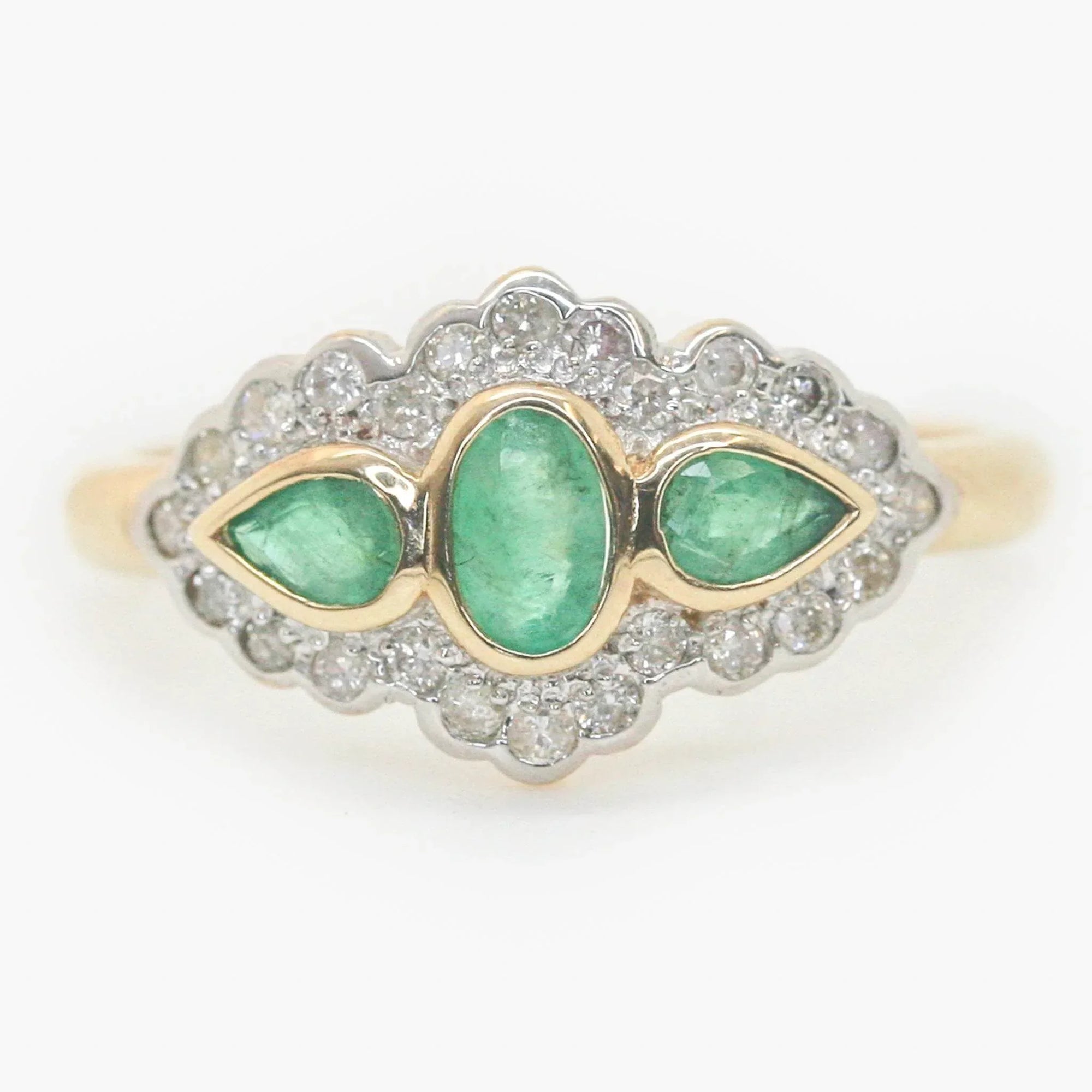 Art Deco Style Three Stone Emerald and Diamond Halo Ring - Jordans Jewellers