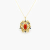 Jordans Jewellers 18ct antique coral, sapphire and brilliant-cut diamonds pendant on an 9ct yellow gold single wheat link chain