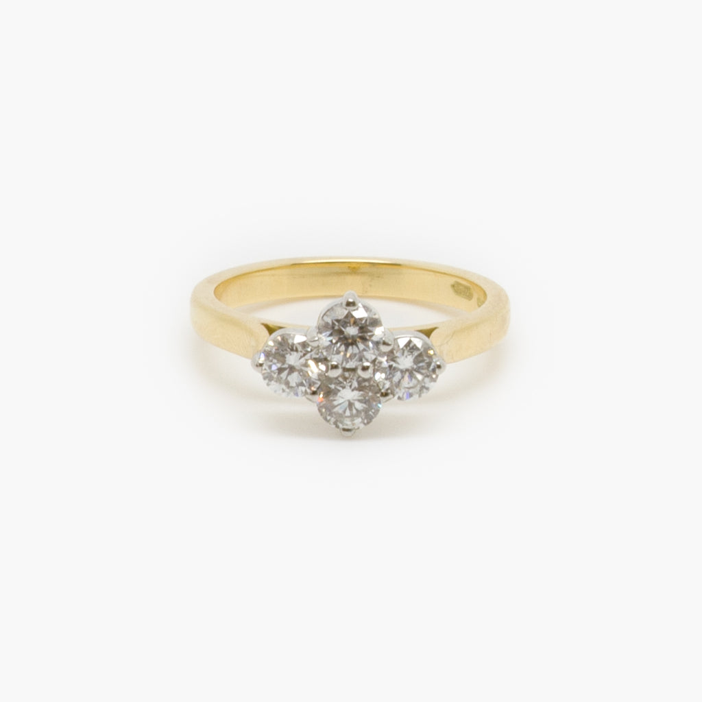 Jordans Jewellers 18ct yellow gold and platinum four stone diamond ring