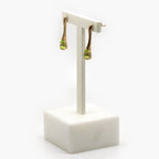 Long 9 Carat Gold & Pear Shaped Checkerboard Cut Peridot Drop Earrings - Jordans Jewellers