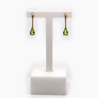 Long 9 Carat Gold & Pear Shaped Checkerboard Cut Peridot Drop Earrings - Jordans Jewellers