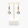 Jordans Jewellers rolled gold blue topaz drop earrings