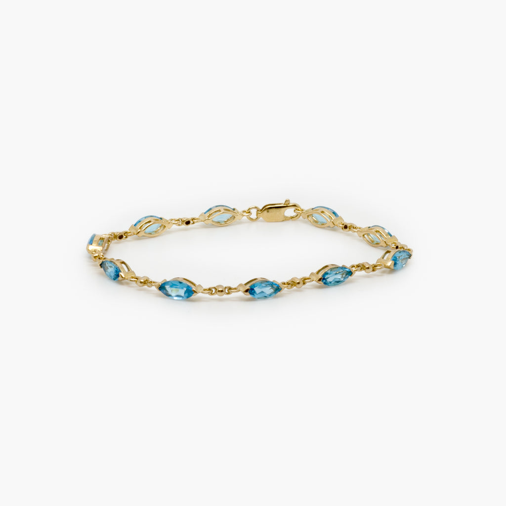 Jordans Jewellers 9ct yellow gold blue topaz bracelet
