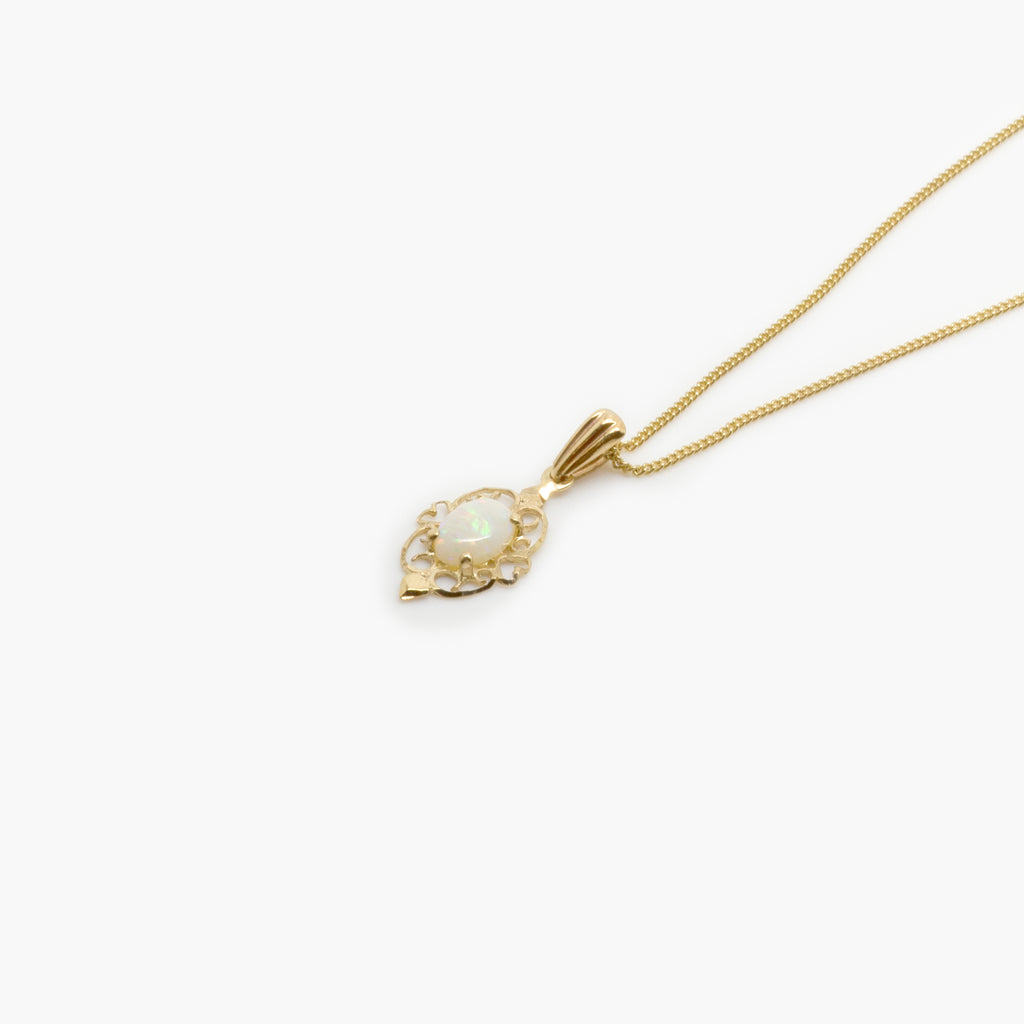 Jordans Jewellers pre-owned white opal pendant on an 9ct yellow gold new 16" chain