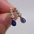 Graduated Diamond Bubble & Pear Shaped Sapphire Drop Earrings - Jordans Jewellers