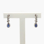 Graduated Diamond Bubble & Pear Shaped Sapphire Drop Earrings - Jordans Jewellers
