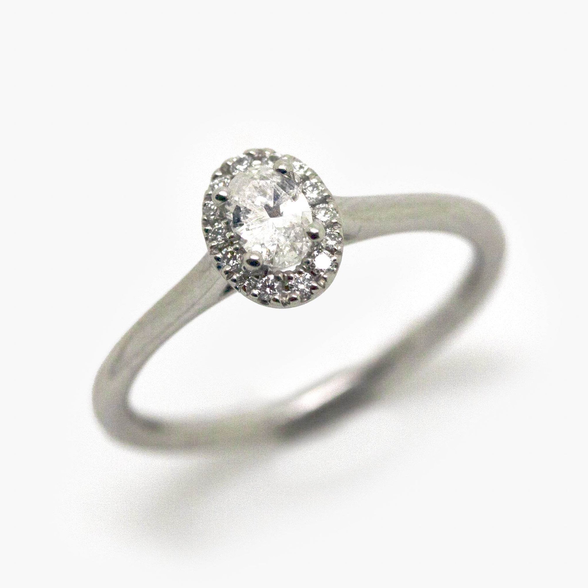 Platinum Oval Diamond Solitaire Halo Ring - Jordans Jewellers
