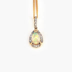 9 Carat Gold Pear Shaped Opal & Diamond Pendant - Jordans Jewellers