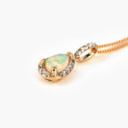 9 Carat Gold Pear Shaped Opal & Diamond Pendant - Jordans Jewellers
